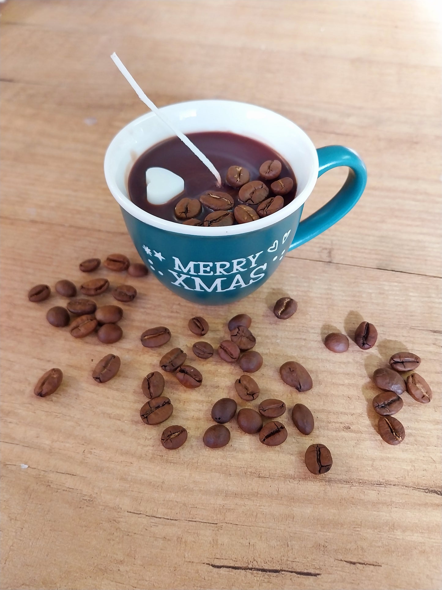 Candela natalizia al caffè